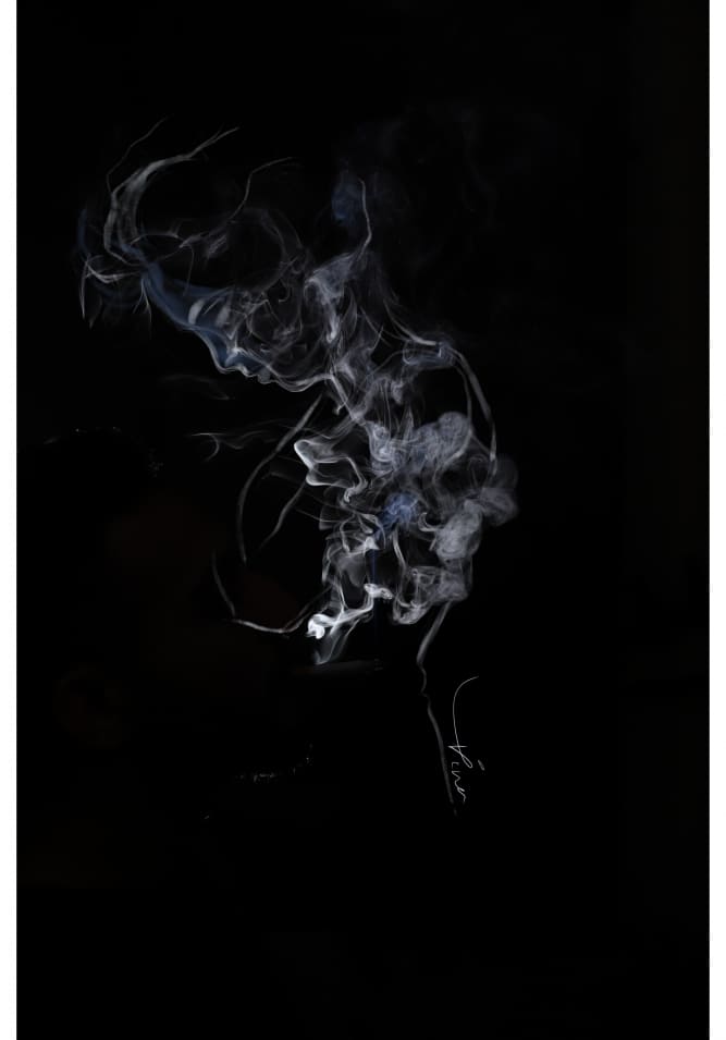 subject through cigarette smoke